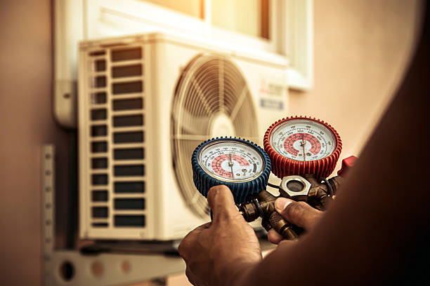 Professional Heat Pump Repair technician working in McAllen, TX
